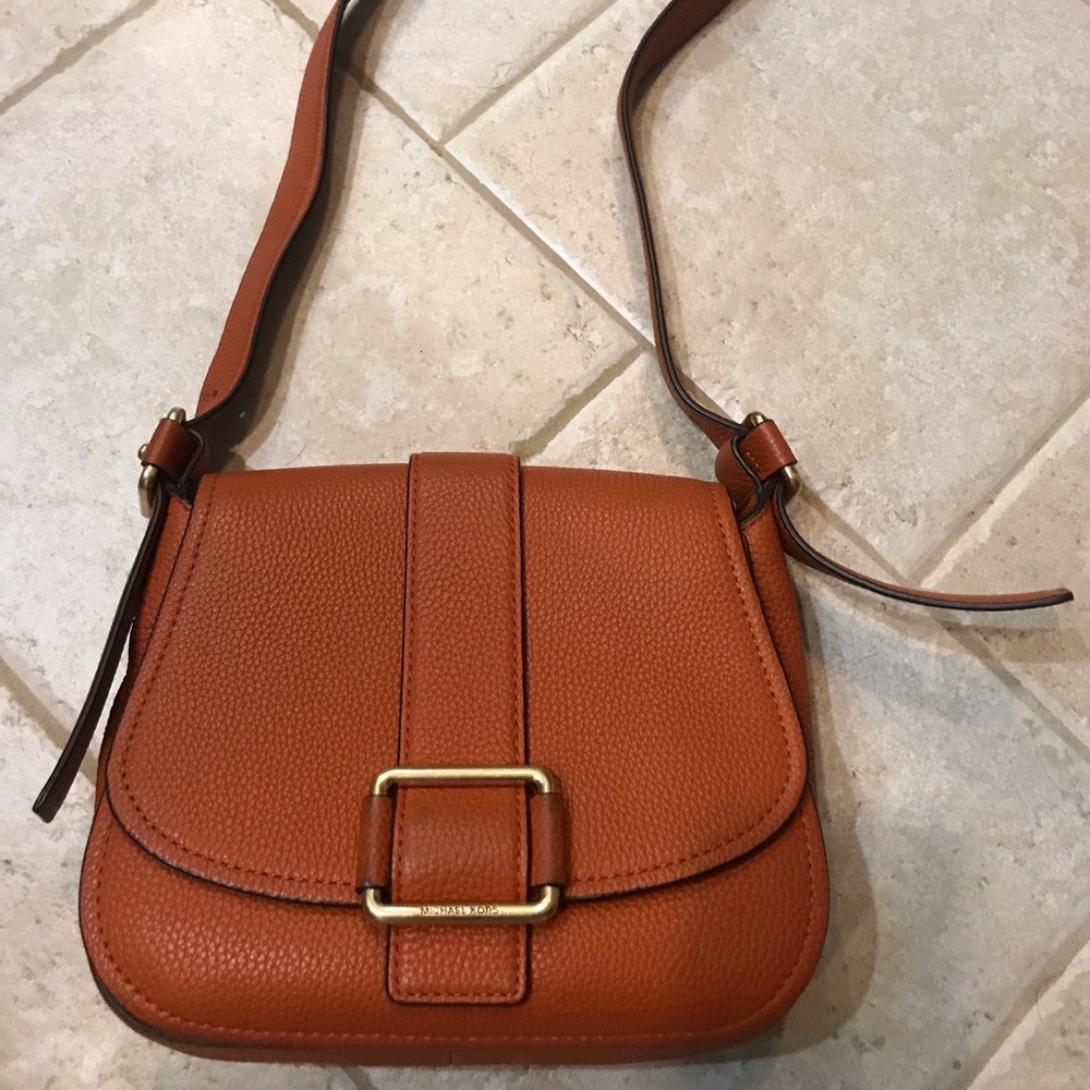 Pebbled leather purse by Michael Kords